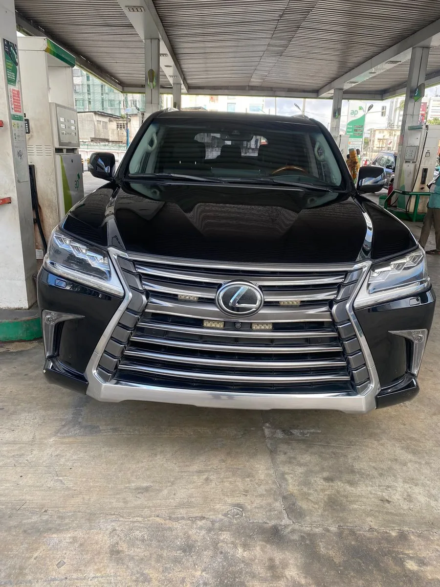 Black Lexus LX 600 parked under a carport in Lagos, front three-quarter view